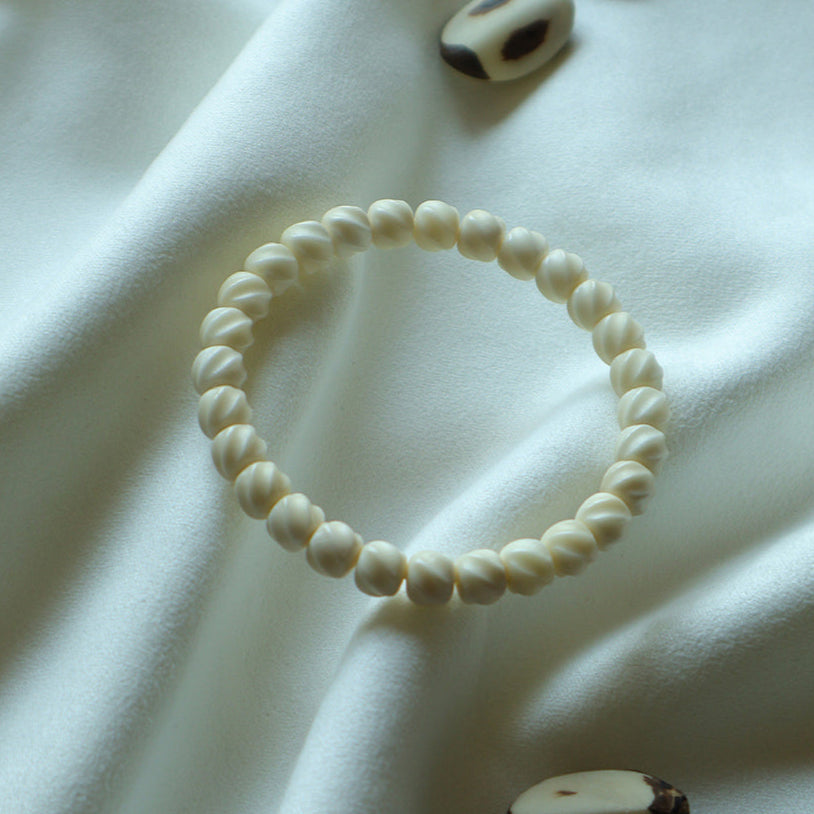 Snowmind – White Lotus Seed Mindfulness Bracelet