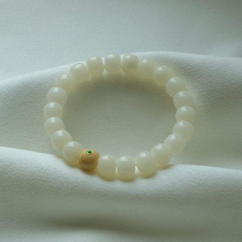Jade Whisper – Root Bead Bracelet with Turquoise Accent
