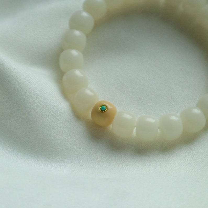 Jade Whisper – Root Bead Bracelet with Turquoise Accent
