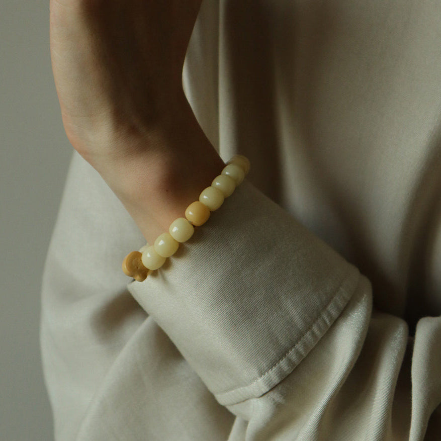 Moonmist – Yellow Root Bead Bracelet