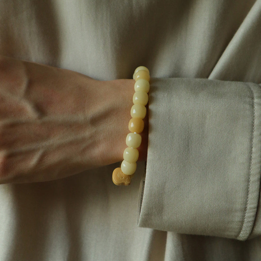 Moonmist – Yellow Root Bead Bracelet