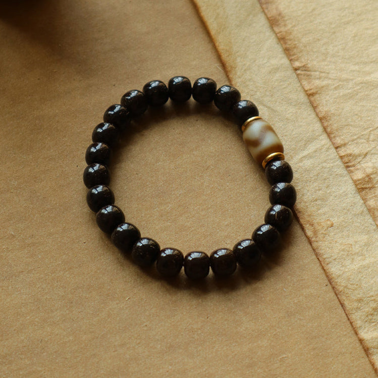 Solar Raven – Black Power Beads with Ivory Fang Accent Bracelet