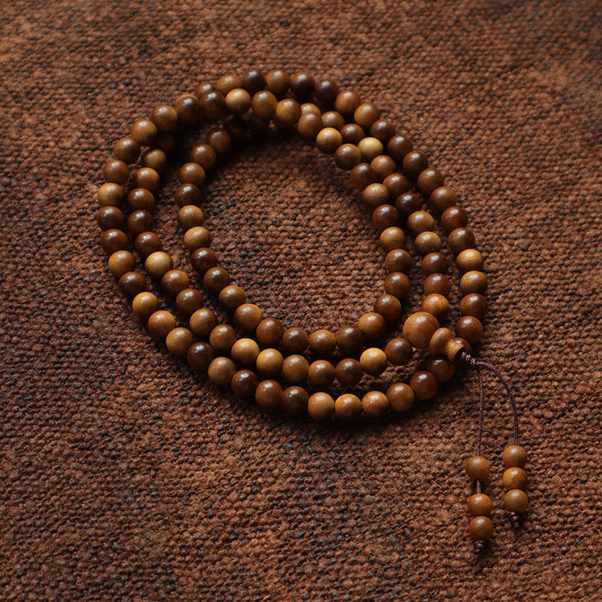 Old Sandalwood Mala (8mm) – ‘A Thread of Stillness’